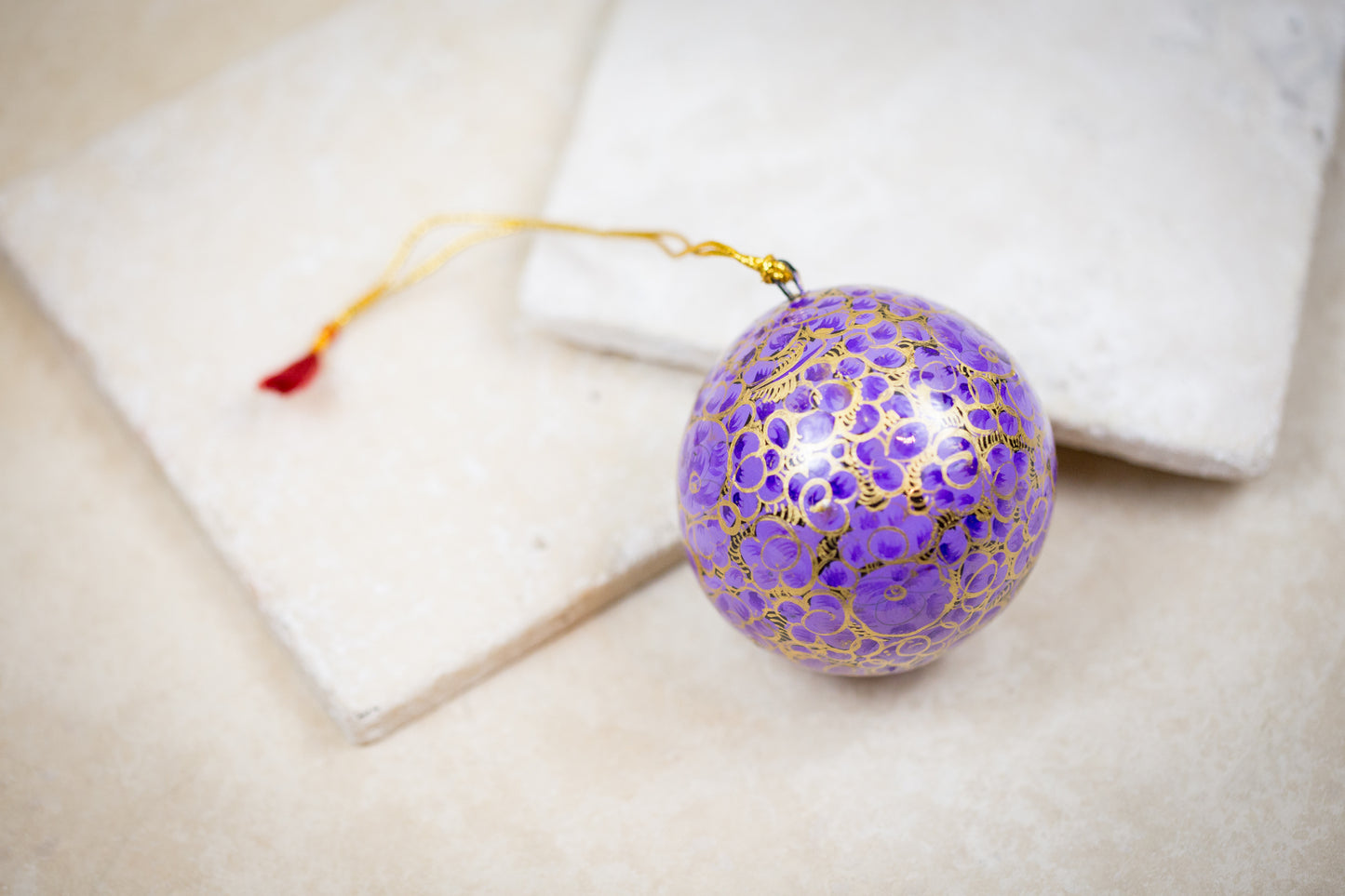 Handmade and hand painted decorative ornament purple gold