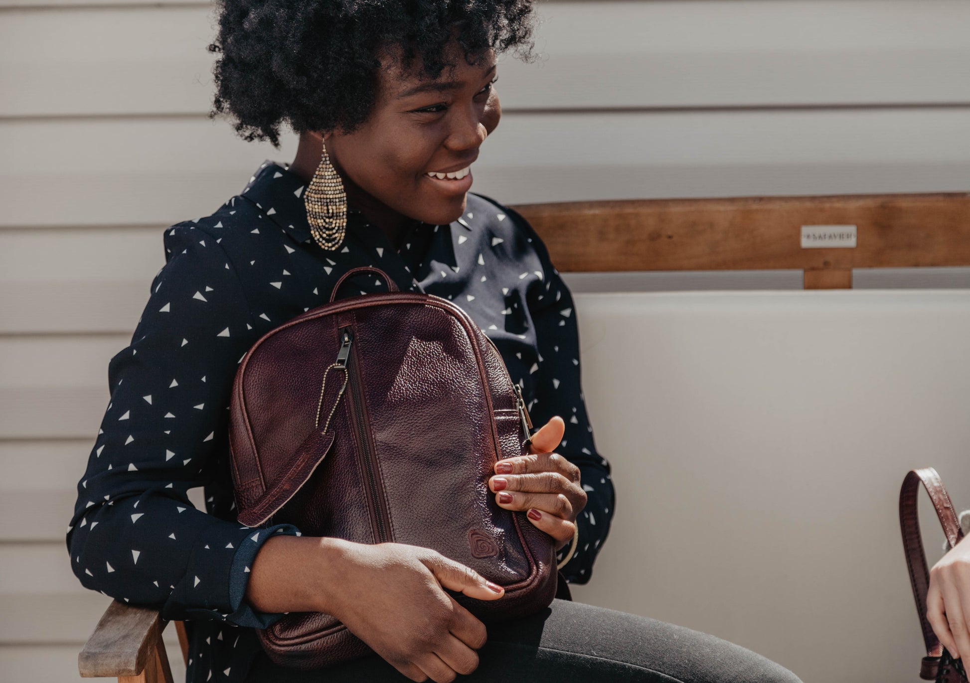 Women with Leather Backpack