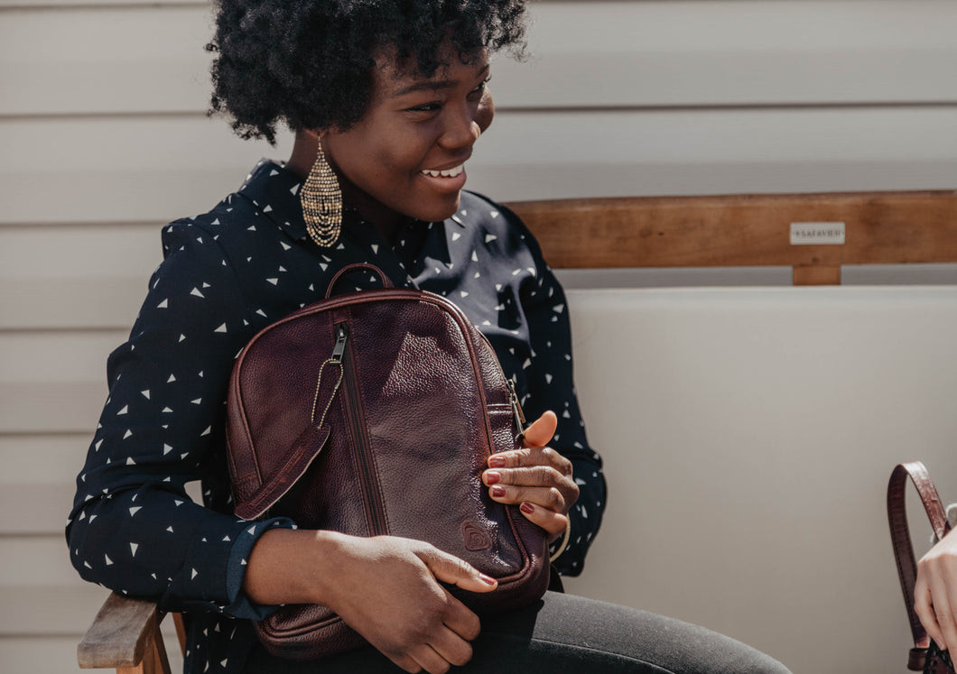 Women with Leather Backpack
