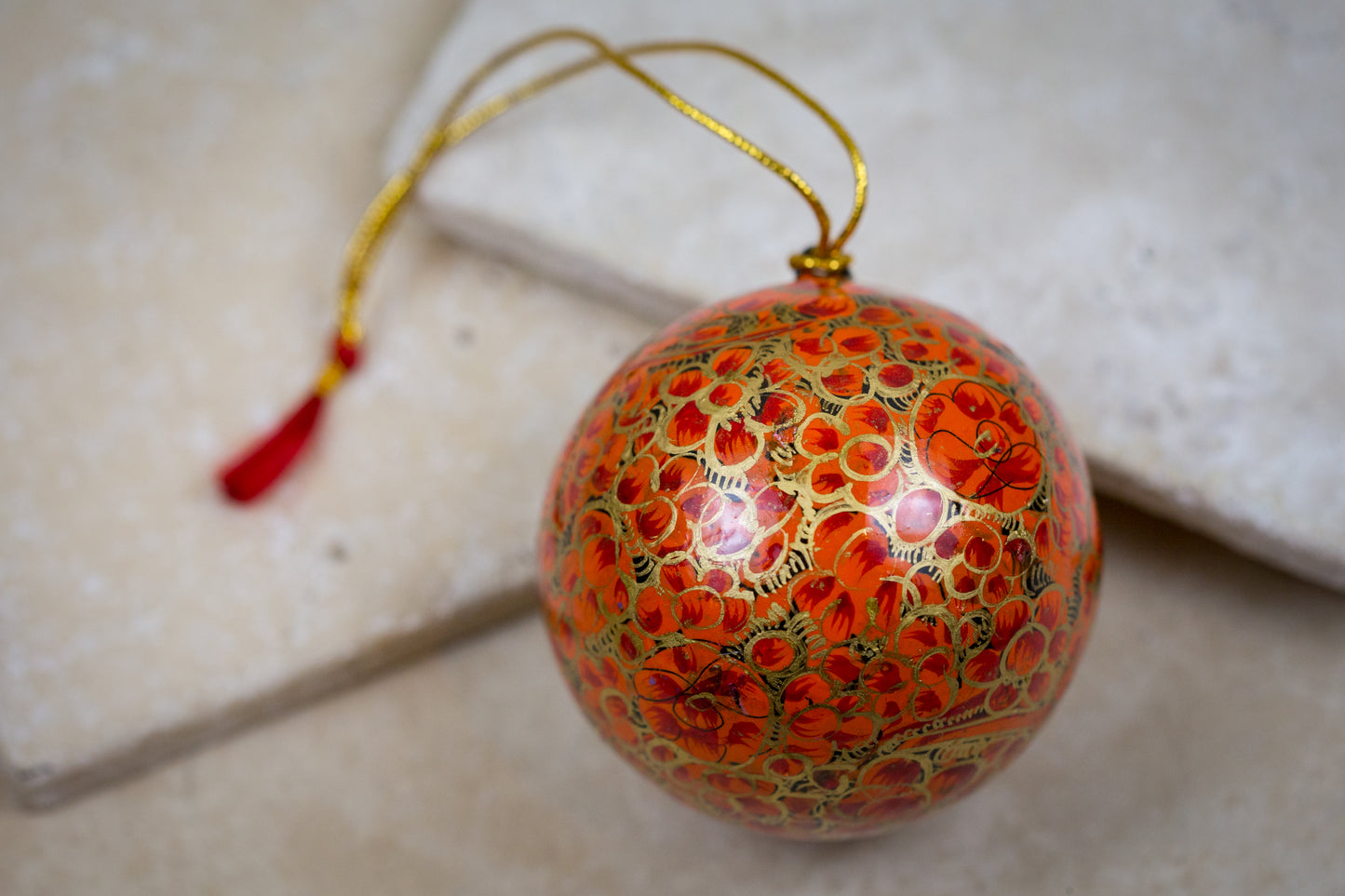Handmade and hand painted decorative ornament orange red gold