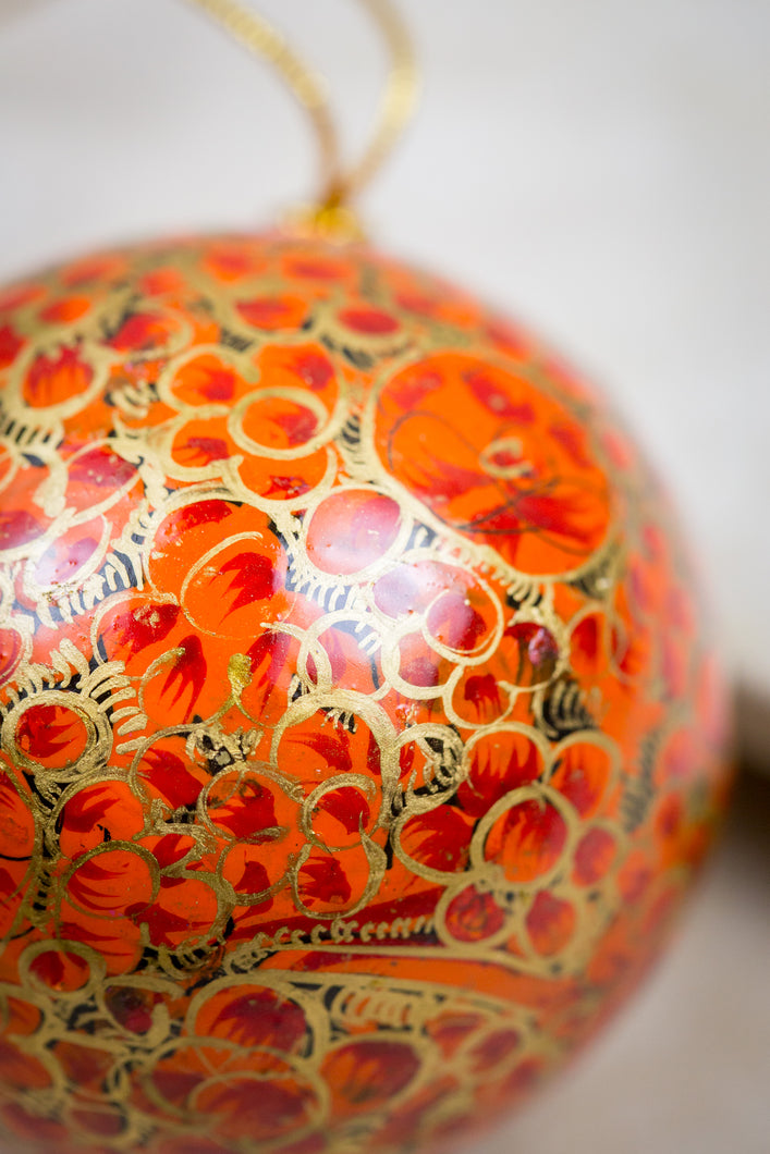 Handmade and hand painted decorative ornament orange red gold